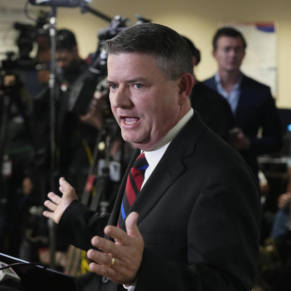 Bill Gates speaking at a press conference